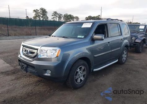 2011 Honda Pilot Touring из США, поврежденный, VIN 5FNYF4H91BB028552